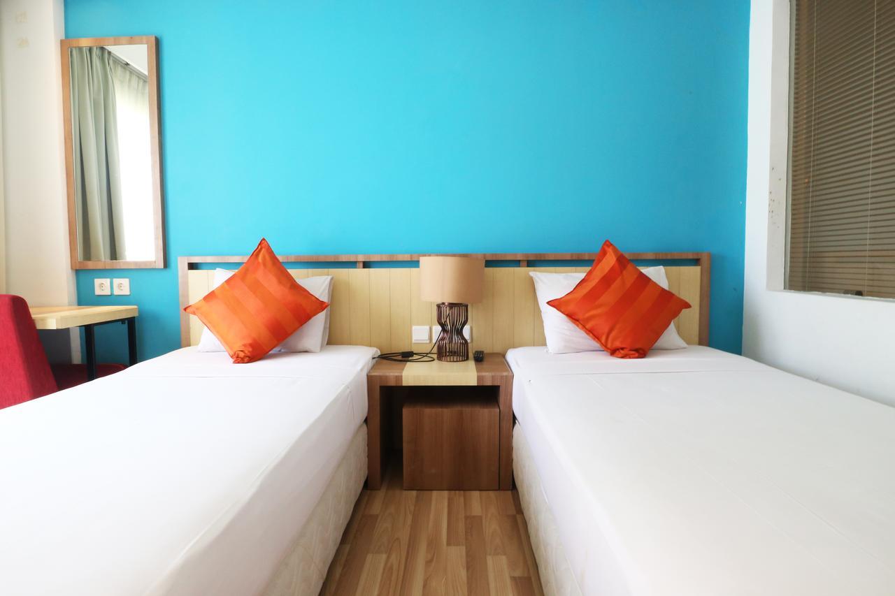 Santosa City Hotel Denpasa Buitenkant foto